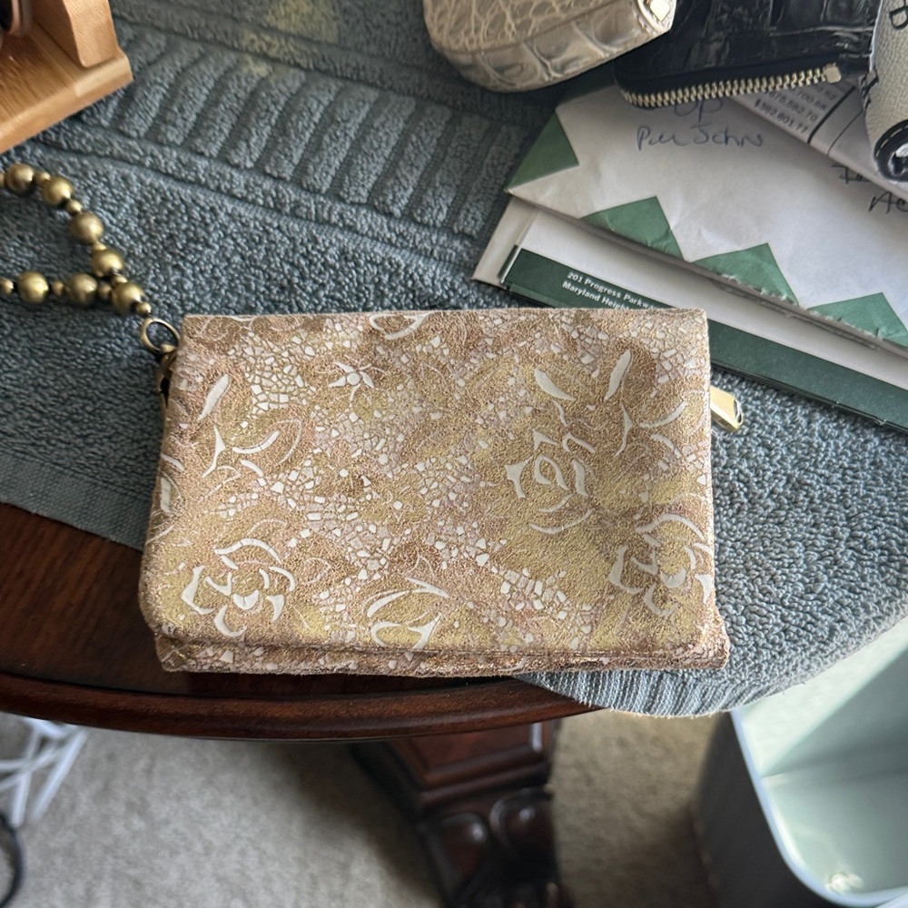 HOBO Gold Floral Clutch